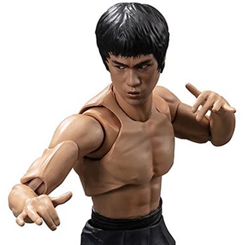 Action figure of Bruce Lee in a beige tank top and black pants on a white background