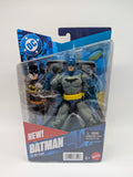 Batman action figure in packaging with DC logo