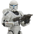 Star Wars action figure in white armor with a gun on a white background
