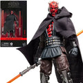 Star Wars action figure of Maul with packaging in the background