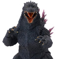  Godzilla action figure with open mouth and raised arms on a white background