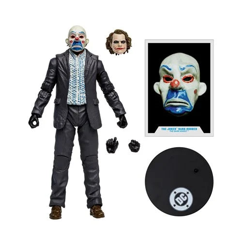 Action figure of the Joker clown with accessories and a DC logo on a white background