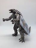 Photo of MechaGodzilla with Bandai tag on still