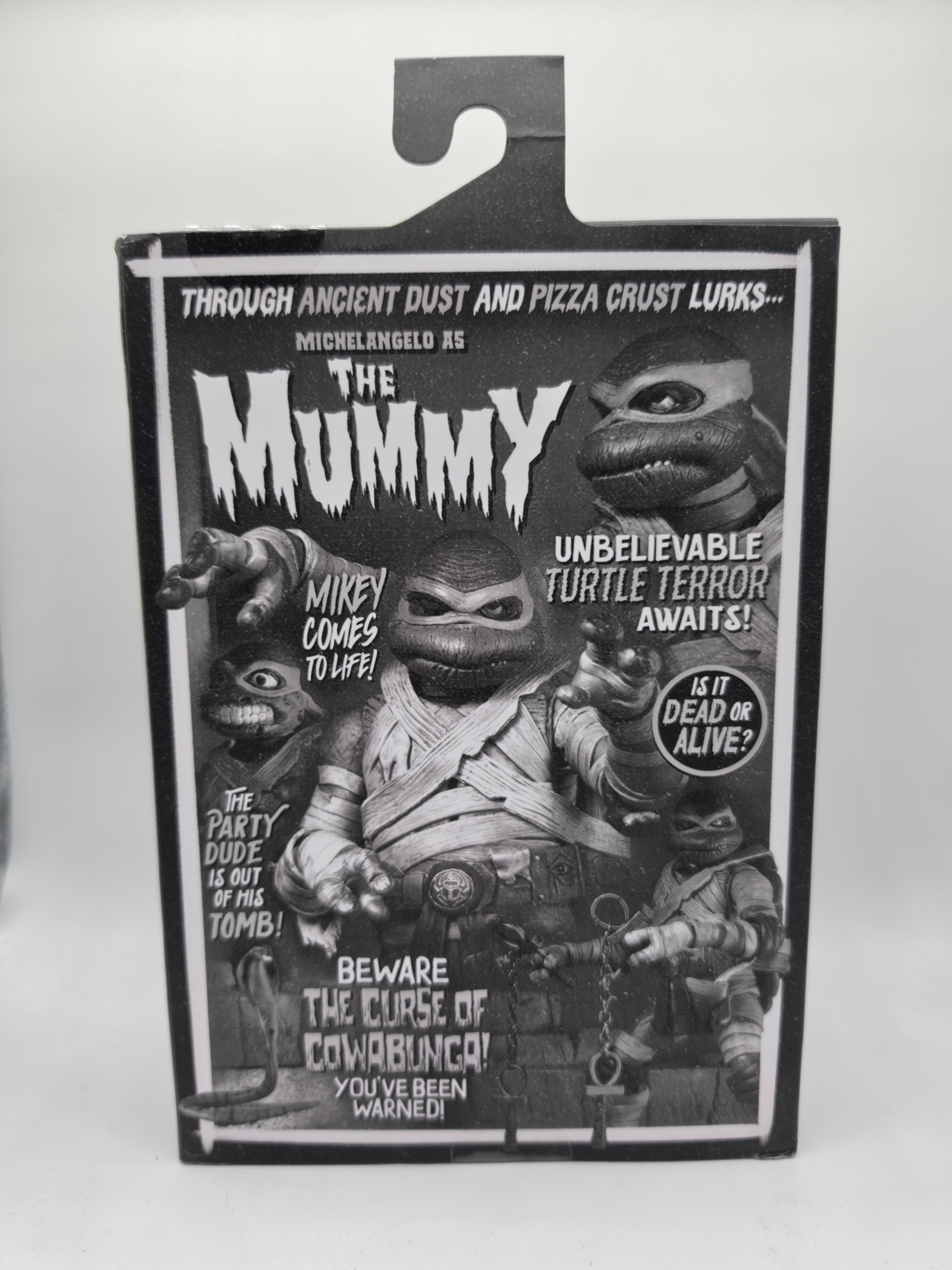NECA 2025 Universal Monsters x TMNT Michelangelo as The Mummy (Black and White)